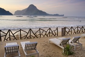 EL NIDO, PALAWAN, PHILIPPINES - 2008/12/16: Sunset over the El Nido archipelago. El Nido, located at the northwestern tip of the Palawan province, is bordered by the Linapacan Strait in the north, the Sulu Sea in the east, and the South China Sea in the west.. (Photo by Jonas Gratzer/LightRocket via Getty Images)