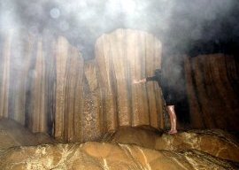 Hugging a rock in a Sagada cave